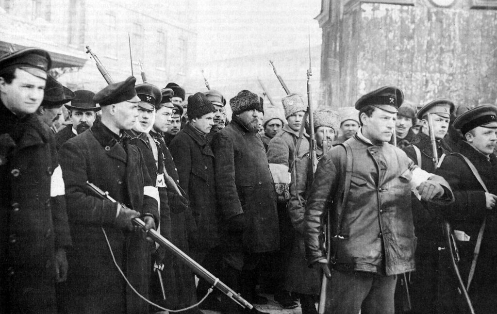 Arrest and escorting plainclothes policemen. Petrograd. 1917.