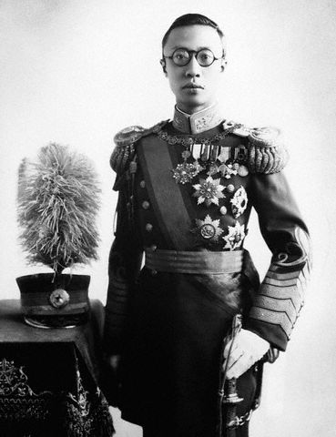 ca. 1940 --- Emperor Pu Yi (known as Henry Puyi in the west) was the last  emperor of China.  He was the first emperor of Manchuko from 1934-35, a puppet monarch for the Japanese. --- Image by © CORBIS